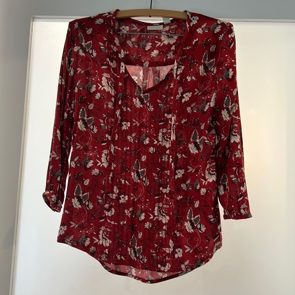 Red floral blouse
